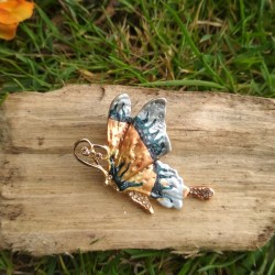 Broche papillon en strass et émail sur bois